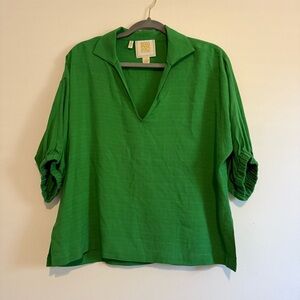 Emily McCarthy green top